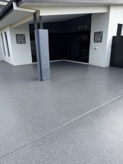 Alfresco patio grey flake epoxy coating by Premium Epoxy Flooring Jimboomba