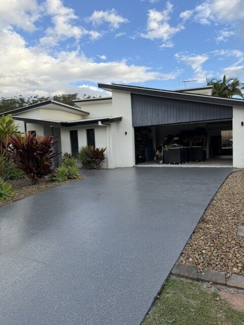 Full driveway dark grey flake epoxy coating by Premium Epoxy Flooring Jimboomba