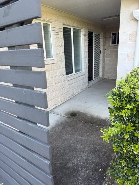 Covered patio entry bare concrete before epoxy coating