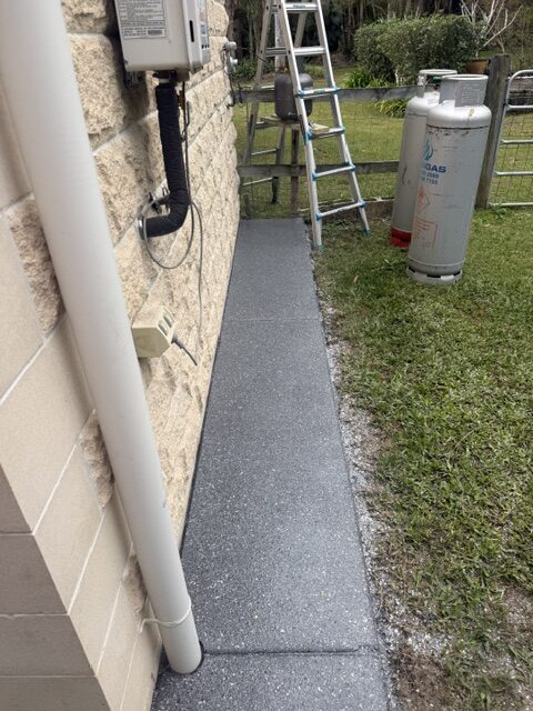 Side pathway dark grey flake epoxy coating by Premium Epoxy Flooring Jimboomba